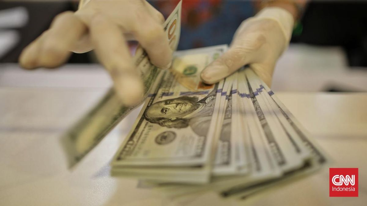 rupiah-melemah-atas-dollar-as-12_169