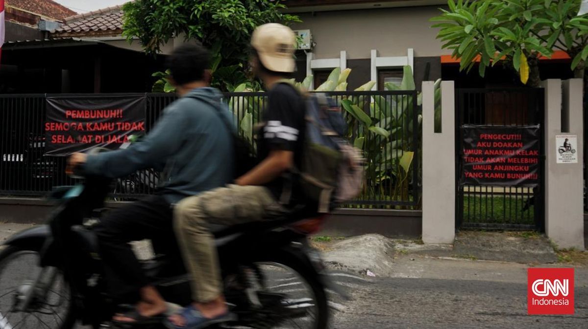 keluarga-di-bantul-pasang-spanduk-kecaman-usai-anjing-mati-diduga-diracun-1786785741430_169